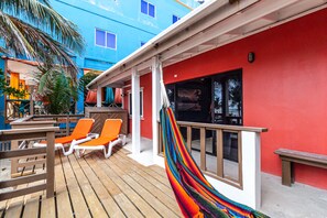 Our back deck with loungers and a hammock.