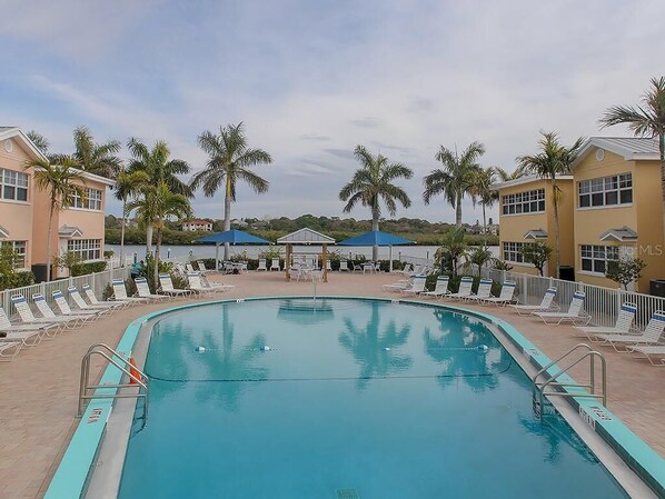 Heated pool overlooking the intercoastal waterway & docks.