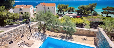 Beautiful view on the pool area and nearby sea.