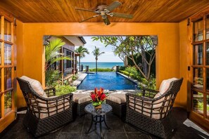 Master bedroom seating overlooking the infiniti edge pool into the pacific