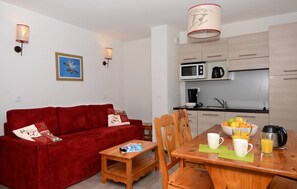 Relax in the open-concept living space which adjoins with the fitted kitchenette.