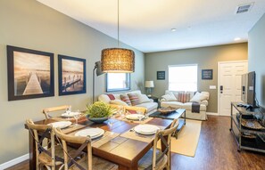 Comfortable living room integrated with kitchen.