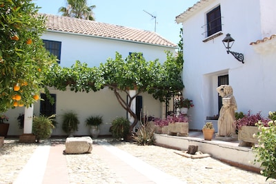 A beautiful Spanish family home located in a beautiful peaceful setting.