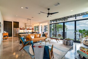 Inviting living room with sliding glass door to the back deck