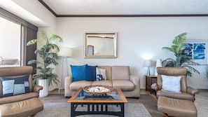 Sofa with two recliners.
