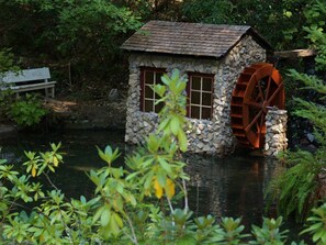The old stone mill house and waterwheel