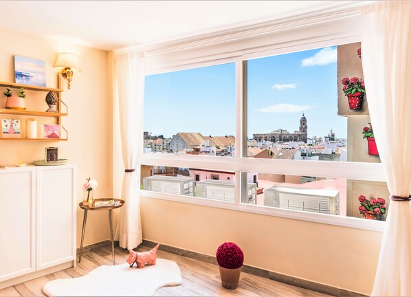 View from the apartment over the Malaga Cathedral and Alcazaba Fortress.