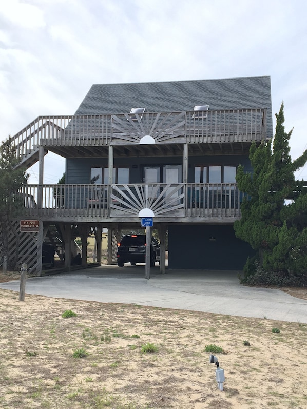 Welcome! Plenty of parking under cottage. Circular driveway and carport.