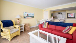 Kick back and relax in our spacious and bright living area with beach views!