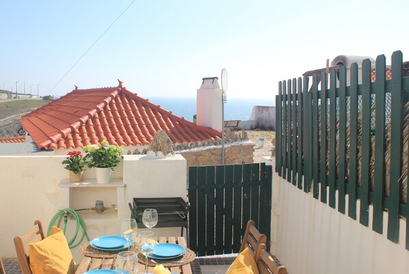 The little terrace is perfect for having a meal or relaxing.