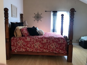 Queen bed in a spacious master bedroom. 