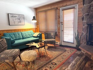 Sitting area with fireplace and Queen sofa sleeper.