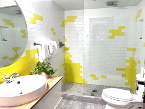 Bath with walk-in rain shower