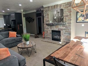 open floor plan with gas fireplace