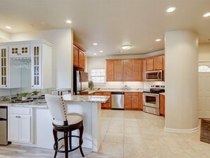 Spacious fully equipped kitchen.