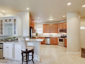 Spacious fully equipped kitchen.