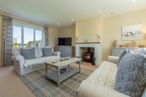 Flint House, Wighton: Light the stove to feel extra cosy