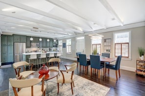 Great room with seating, dining for 6 at the table and another 6 at the island