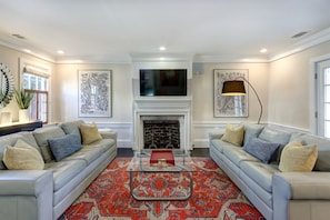 Living room with seating for at least 8