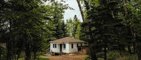 Cedar, our little one bedroom cottage. Tucked in the woods just so. 