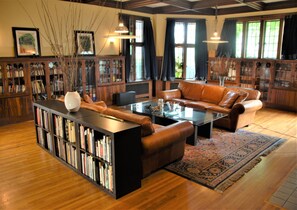 Library: Leather Couches, Books, Board Games...