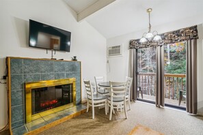 Get toasty warm next to the electric fireplace in the winter, and cool down in the AC in the summer.
