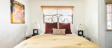 Bedroom #3 is a plush queen bed with a comfy mattress and bedding.  Tv and fan