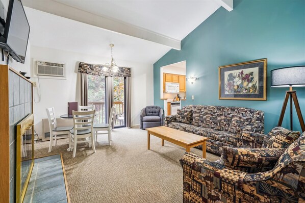 Get toasty and warm next to the electric fireplace.