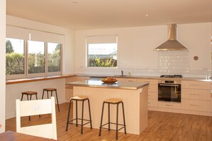 Kitchen  & bifolds to deck