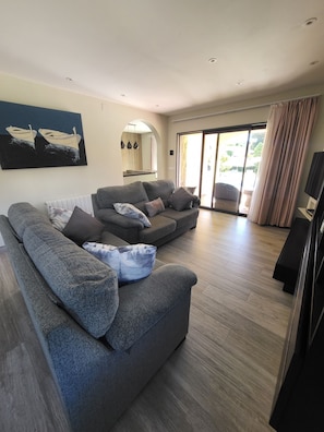 Lounge over-looking the pool and garden