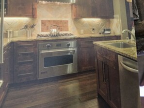 Another view of a full size kitchen
