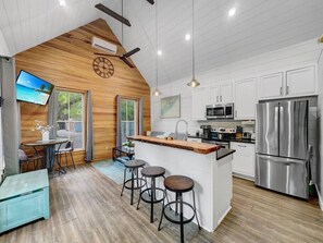 Living area and Full Kitchen. 