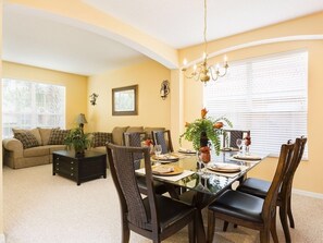 Formal Dining Room and Living Room with Queen Sofa Bed