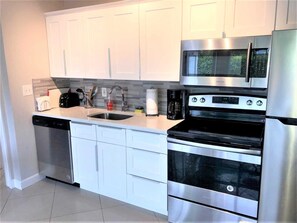 Kitchen has all new stainless appliances.