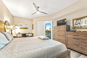 The master suite offers a King bed, sliders to the balcony, smart TV, Ensuite bathroom, large walk in closet, desk for remote work!