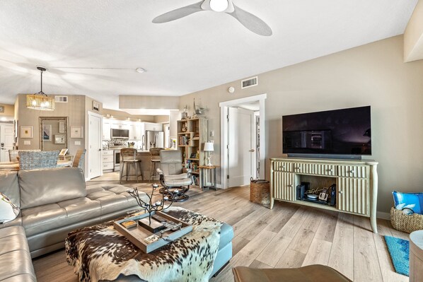 The spacious living area features plenty of room for relaxation after enjoying all NSB has to offer! Take advantage of the large flat-screen TV and large covered balcony.
