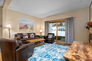 Living Room with leather furniture and outdoor access