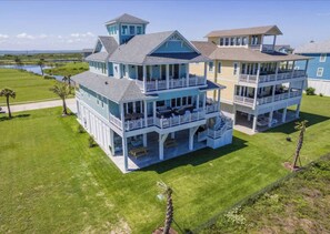 Rear of Sea of Grace two Large patios with comfortable