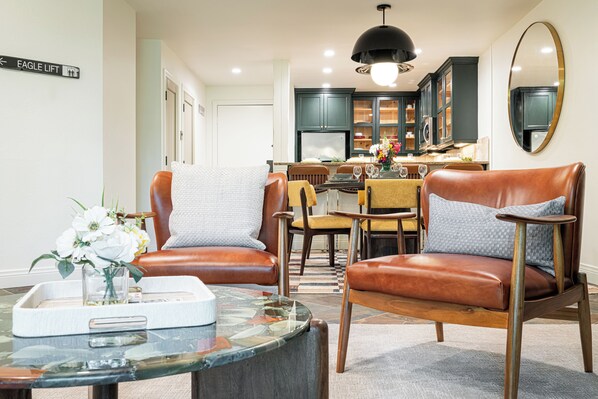 Comfortable Living Room Furnishings Including a Queen Sleeper Sofa