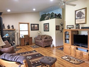 Living room has a queen sleeper sofa and a twin sleeper sofa