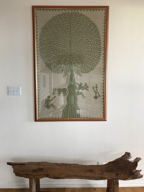 'Tree of life' art work and teak bench from India