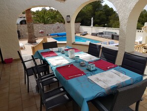 Balcony dining area with table for 8 people