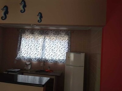 Aconchegante  apartamento a 150 mtrs da Praia Grande. 