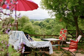 Outdoor Day Bed and Seating Area with a View 