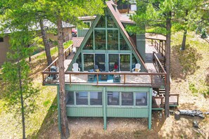 Exterior | Wraparound Deck w/ Seating | Wooded Lot