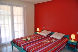 The two bedrooms may feature a variety of bedding arrangements.