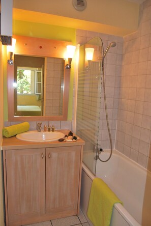 Get ready for your day in the lovely bathroom.