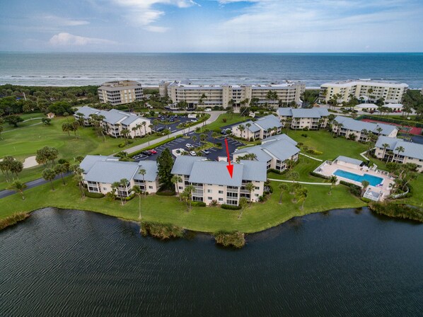 Bird's Eye View of lakes, golf course and sunsets!   5 minute walk to beach!
