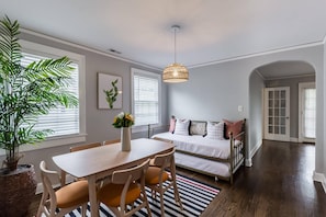 Well lit living room with seating for your group! 
