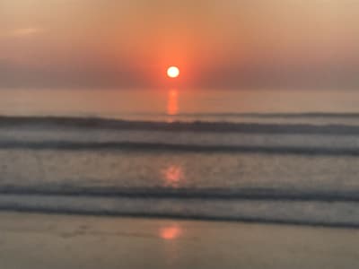 Luxury Condo!   Enjoy sunset  and  sunrise one block from the beach!